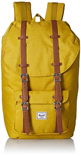 Mochila vintage Herschel de color amarillo mostaza con correas de cuero y dos bolsillos.